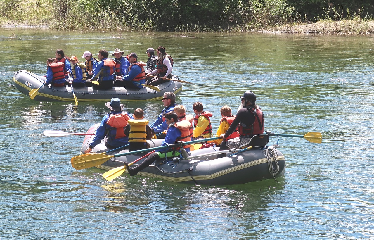 group of people kayaking in a rive